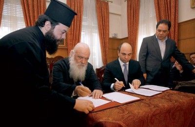 His Beatitude Archbishop of Athens and All Greece Ieronimos and Travel Plan’s CEO George Daskalakis during the signing of the memorandum of understanding that is expected to attract worshippers from abroad to Athens.