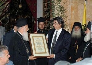 The Ecumenical Patriarch Bartholomew honors ANEK LINES CEO Yiannis Vardinoyannis.