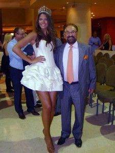 Miss Porto Carras 2012 with the president of Technical Olympic Group of Companies (Porto Carras), Konstantinos Steggos.