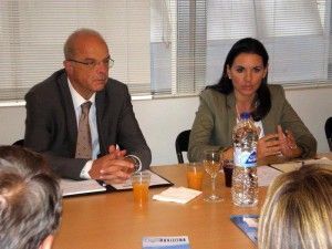 Greek Tourism Minister Olga Kefalogianni discusses the tourism sector's pending issues with the General Pan-Hellenic Federation of Tourism Enterprises. To her left is her adviser Professor Harry Coccossis.