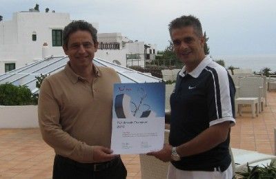 Creta Maris Beach Resort’s CEO and general manager, Andreas Metaxas, and director, Nikos Vlassiadis, holding the hotel’s “TUI Environmental Champion 2012” title.