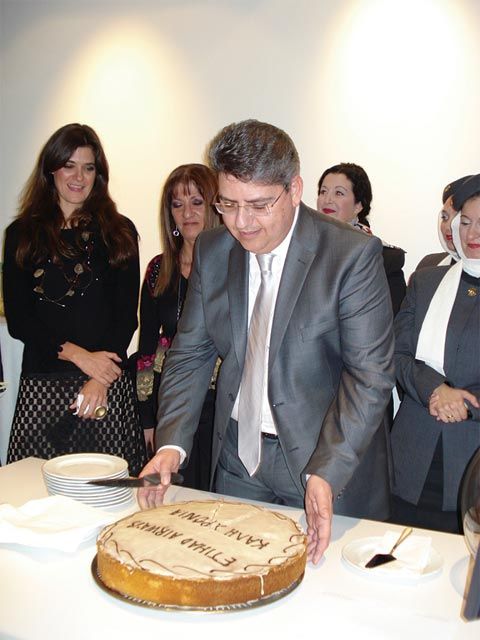 Etihad Airways Director in Greece Dimitris Karagioules cutting the airline company’s New Year’s pita. Etihad Airways recently celebrated seven years of operation.