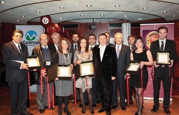 President of Manessis travel organization, Andreas Manessis (center) with the finalists of the Top 10 hotel awards for 2010. During the award ceremony, Mr. Manessis presented an honorary award of outstanding collaboration to the Amalia hotel chain.