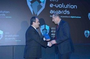 Airtickets.gr CEO Dimitris Kontogeorgos accepts the e-volution award from Deputy Development Minister Athanasios Skordas.
