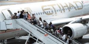 Passengers boarding an Etihad Airways flight.