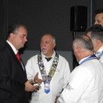 The secretary general of the Greek National Tourism Organization, Panos Livadas (left), speaking to the president of the Hellenic Chef’s Federation, Miltos Karoubas (center), and the federation's members on the benefits of the organization of the 37th WACS Congress in Athens. 