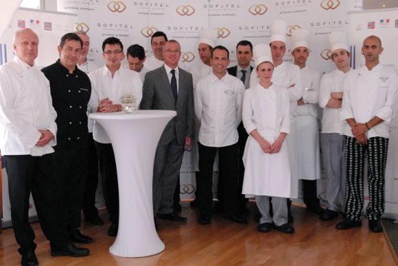 Sofitel Athens General Manager Cyril Manguso (center) with the hotel's cooking team.
