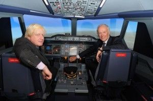 President of Emirates, Tim Clark and Mayor Johnson test the A380 flight simulator at the opening of Emirates Aviation Experience.