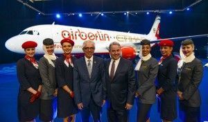 airberlin's Chief Executive Officer Wolfgang Prock-Schauer and Etihad Airways' President and Chief Executive Officer and Vice-Chairman of airberlin James Hogan with flight crew. airberlin and Etihad Airways recently unveiled an Airbus A320 aircraft in specially designed joint livery.
