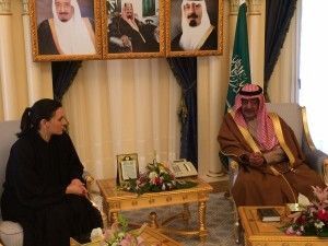Greek Tourism Minister Olga Kefalogianni discusses with Saudi Arabia's second deputy prime minister Prince Muqrin bin Abdulaziz who is second in line to the throne and has the third most important position in the hierarchy of power in the kingdom, after the king and crown prince.