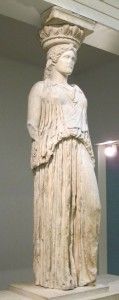 A caryatid from the Erechtheion, stands alone, displayed at the British Museum.
