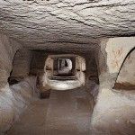 Inside the catacombs, on both sides of the walls & the floor, there are vaults which contain graves (126 are found) Photo © Municipality of Milos