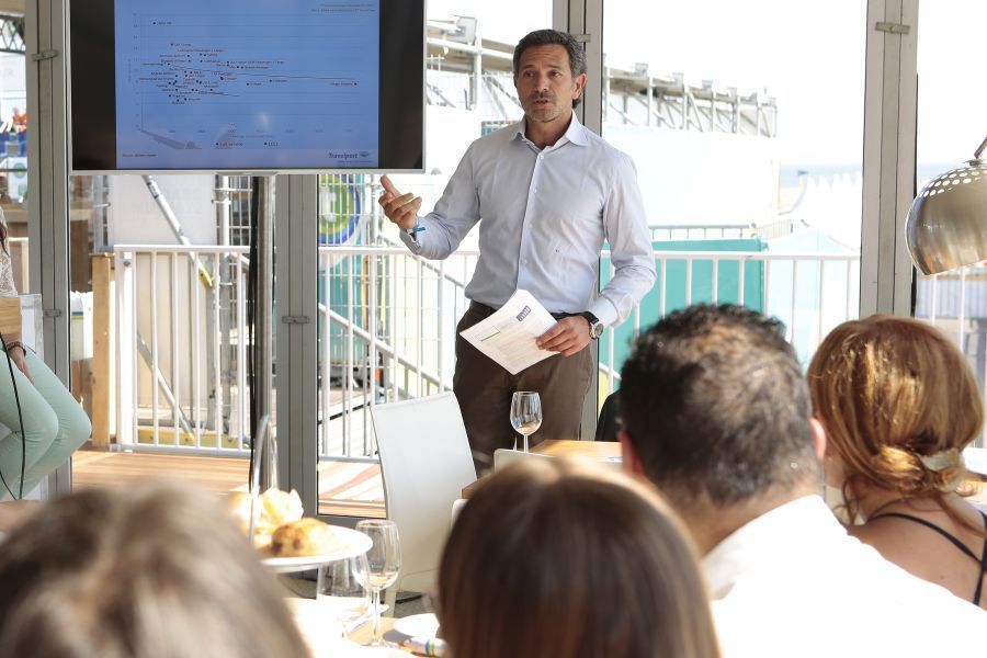 Travelport's Damiano Sabatino, VP and Managing Director for Western Europe, speaking to journalists from Greece, Italy and Portugal at a media briefing held during a VIP event at the Transavia Grand Slam Beach Volleyball, sponsored by transavia.com.