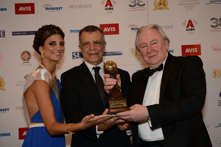 Ioannis Zografakis, SWISS regional manager for Greece and Turkey, receiving the award from World Travel Awards President Graham Cooke.