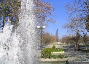 A fountain in Larissa Park. In the back one can see a monument created by the artist Filolaos Tloupas from Larissa. Photo © Konstantinos Ntougkas