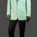 Buddy Holly, Mint Green Jacket & Grey Trousers.