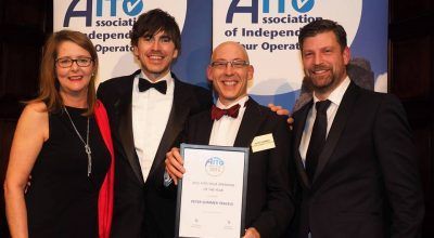 Travel writer and TV presenter Simon Reeve (second from left) after giving the 2015 AITO Tour Operator of the Year Gold Award to Peter Sommer (second from right) of Peter Sommer Travels.
