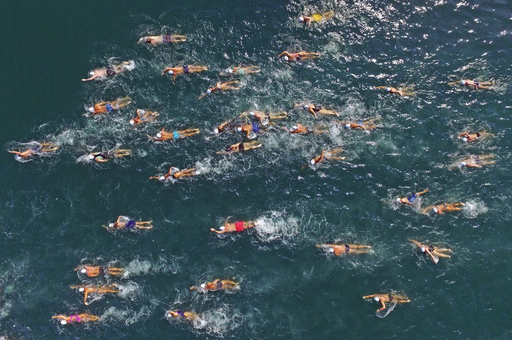 Panoramic view of the swimmers of Navarino Challenge in the beautiful bay of Navarino at the picturesque port of Pylos (photo credit: Loukas Hapsis).