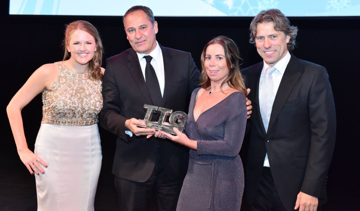 James Harrison, UK General Manager for Etihad Airways (second from left) receives the award from Pippa Jacks, Editor of TTG, Stefanie Bowes of Birmingham Airport and Comedian and Host of the TTG Awards, John Bishop.