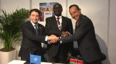 Juan Torres, East Africa Regional GM, Amadeus IT Group; Taleb Rifai, United Nations World Tourism Organization (UNWTO) Secretary-General; and Lazarus Amayo, the High Commissioner in the UK from the Kenyan Ministry of Tourism, signed the global CSR plan.