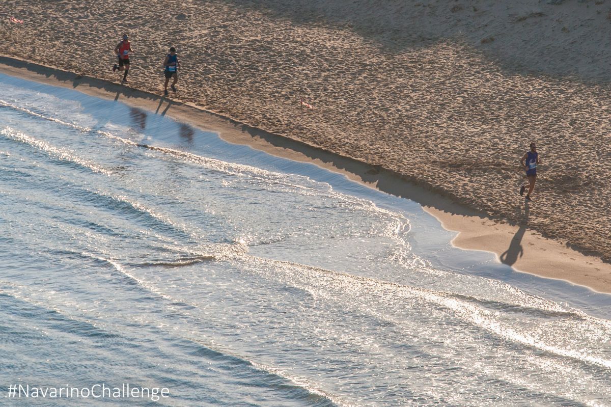 Navarino Challenge runners crossing Voidokilia beach (photo by Elias Lefas).