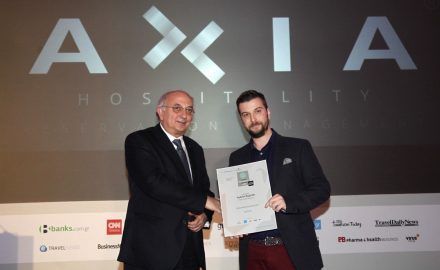Axia Hospitality founder and CEO received the award from deputy foreign minister Ioannis Amanatidis.