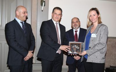 Marketing Greece CEO Ioanna Dretta receives the honorary plaque by the Minister of Energy, Commerce, Industry and Tourism of Cyprus Georgios Lakkotrypis. Also present at the conference were the president of the Cyprus Hotel Managers Association Charis Loizidis and the Chairman of the Parliamentary Committee for Commerce, Industry and Tourism Angelos Votsis.