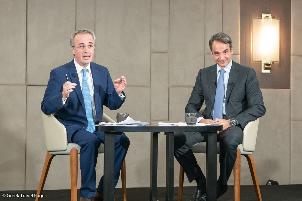 New Democracy party leader Kyriakos Mitsotakis (right) during the 26th general assembly of the Greek Tourism Confederation (SETE).