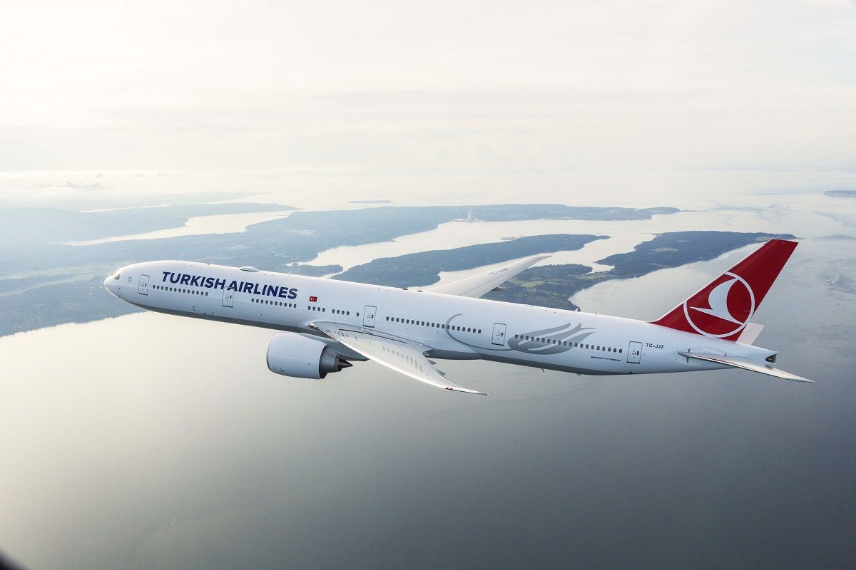 Turkish Airlines Boeing 777-300ER photographed on 6 April 2015 from Wolfe Air Aviation Learjet 25B by Chad Slattery.