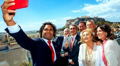Former football player Christian Karembeu is among the speakers of the Peace and Sport Regional Forum. In the photo with South Aegean Governor George Hatzimarkos; modern pentathlon Olympic medallist Joël Bouzou; former Tourism Minister of Greece Fani Palli Petralia and Aegean Public Relations and Press Director Roula Saloutsi. Photo Source: @George Hatzimarkos