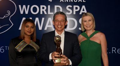 Metaxas Group of Companies CEO Andreas Metaxas and World Spa Awards Managing Director Rebecca Cohen (R) during the awards ceremony.