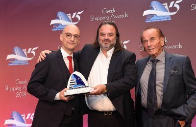 Seajet's Marios (center) and Panagiotis Iliopoulos receive the Lloyd’s List Award by Kyriakos Mitsotakis, Commercial Director of Award Sponsor Five Oceans Salvage.