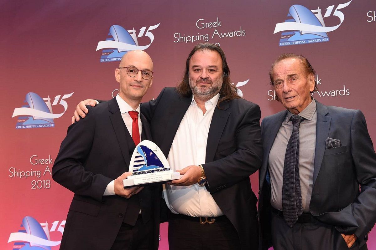 Seajet's Marios (center) and Panagiotis Iliopoulos receive the Lloyd’s List Award by Kyriakos Mitsotakis, Commercial Director of Award Sponsor Five Oceans Salvage.