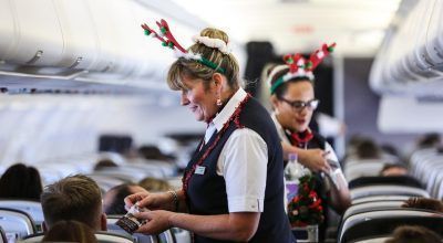 LAPLAND, FINLAND: Andrea Hatfield (Cabin Crew) gets into the Christmas spirit onboard a special charter to Lapland from London Gatwick on 07 December 2015