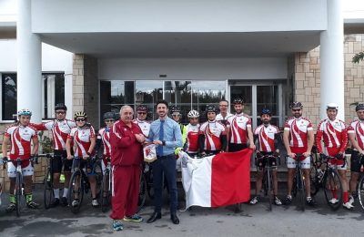 Louis Phaethon Beach Hotel's Service Manager with the Malta Cycling Federation team.