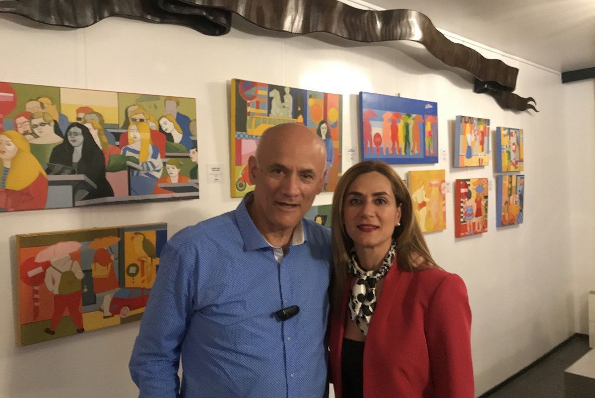 Artist Kostas Spyropoulos with the manager of Grecotel Pallas Athena Mary Karassouli.