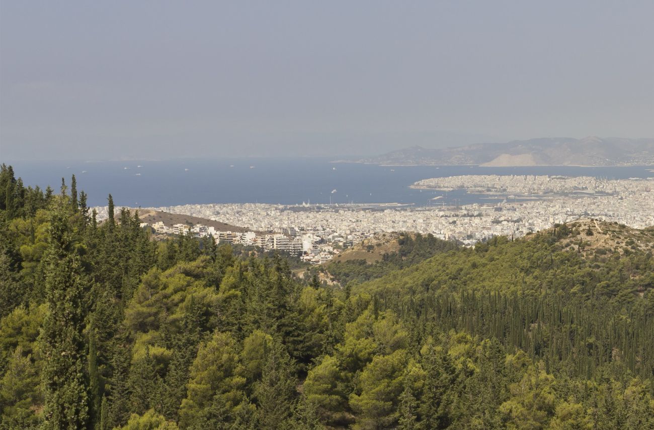 View from Kaisariani Hill looking towards Athens, with Salamis visible in the background. Photo by A.Savin (Wikimedia Commons · WikiPhotoSpace)