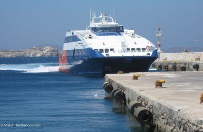 ferry ship vessel arriving in port
