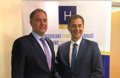 Alexandros Vassilikos, President of the Hellenic Chamber of Hotels with the Greek Minister of Tourism Haris Theocharis