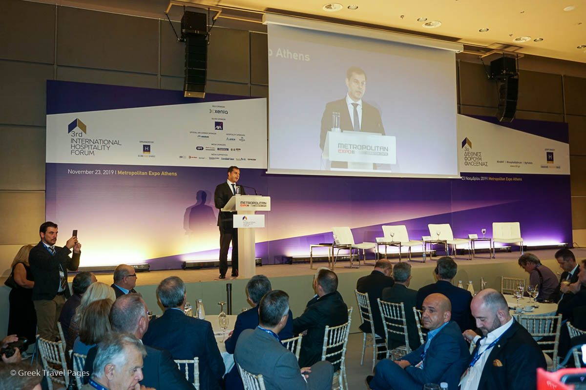 Greek Tourism Minister Harry Theoharis speaking at the 3rd International Hospitality Forum of the Hellenic Chamber of Hotels.