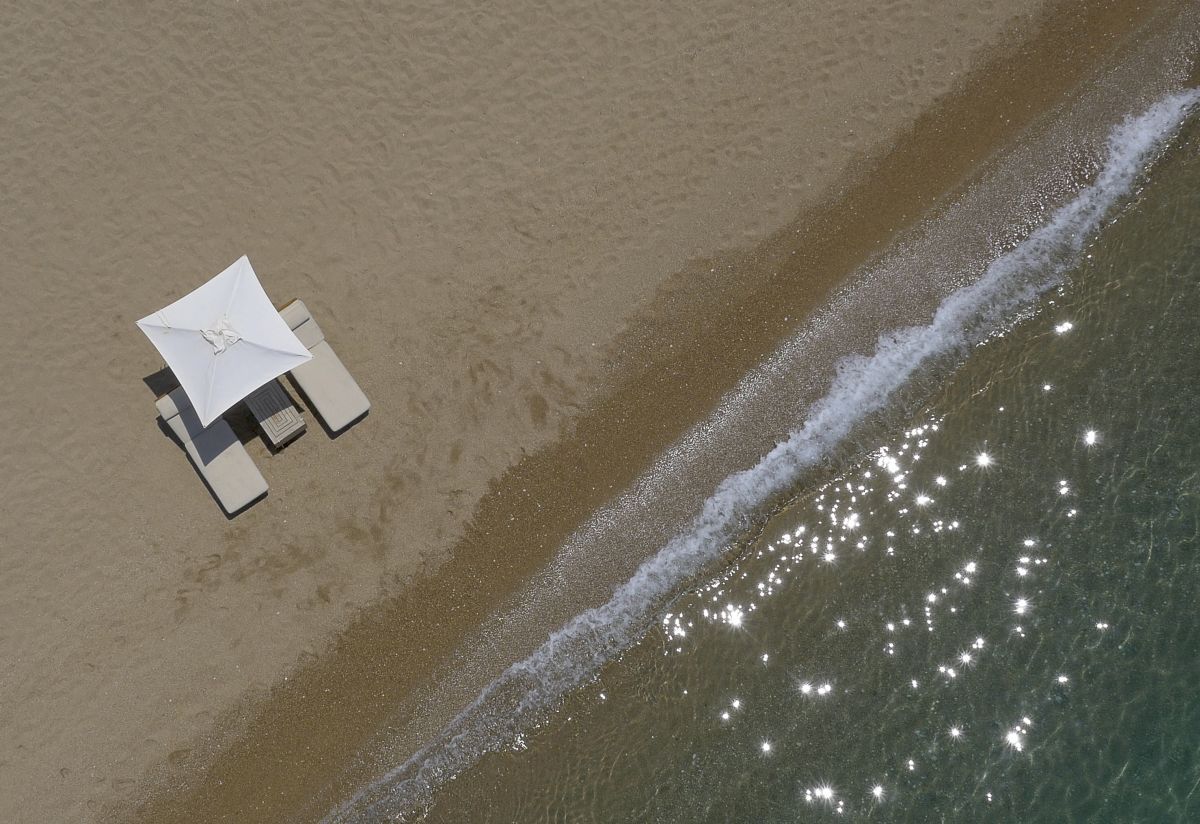 Romanos beach, umbrellas, aerial photo, drone, by Orfeas Kalafatis