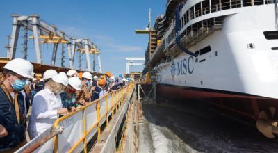 Water enters the dry dock to float MSC Seashore for the first time.
