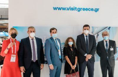Greek Tourism Minister Vassilis Kikilias (second from right) and Greek National Tourism Organization Secretary General Dimitris Fragakis (second from left) with representatives of Air France at the Greek stand at the IFTM Top Resa expo in Paris.