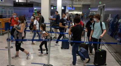 Passengers making their way to a checkpoint upon their arrival at Athens International Airport Photo source: European Union / Yorgos Karahalis