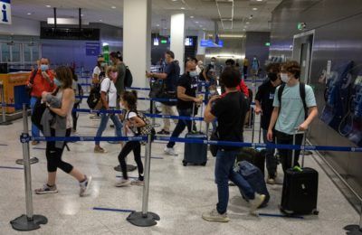 Passengers making their way to a checkpoint upon their arrival at Athens International Airport Photo source: European Union / Yorgos Karahalis