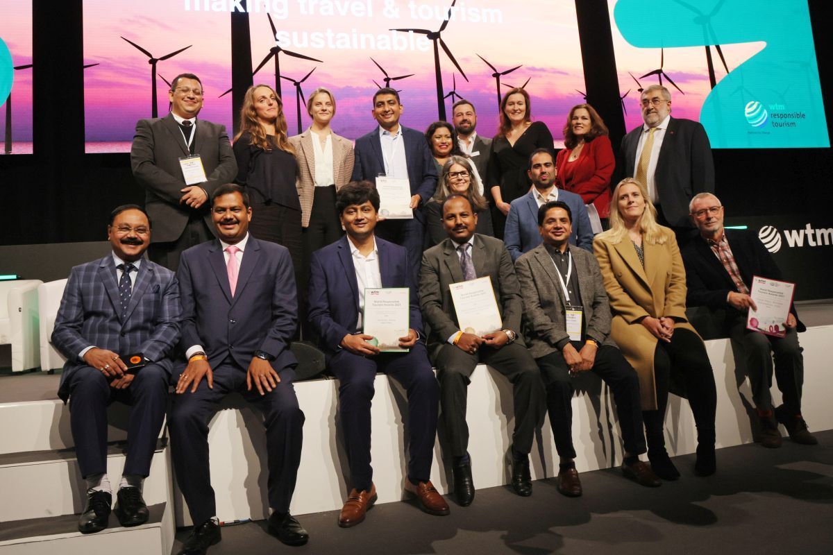 World Travel Market London, ExCeL - WTM 2021 - Responsible Tourism Awards, Global Stage - Group photo of award winners.