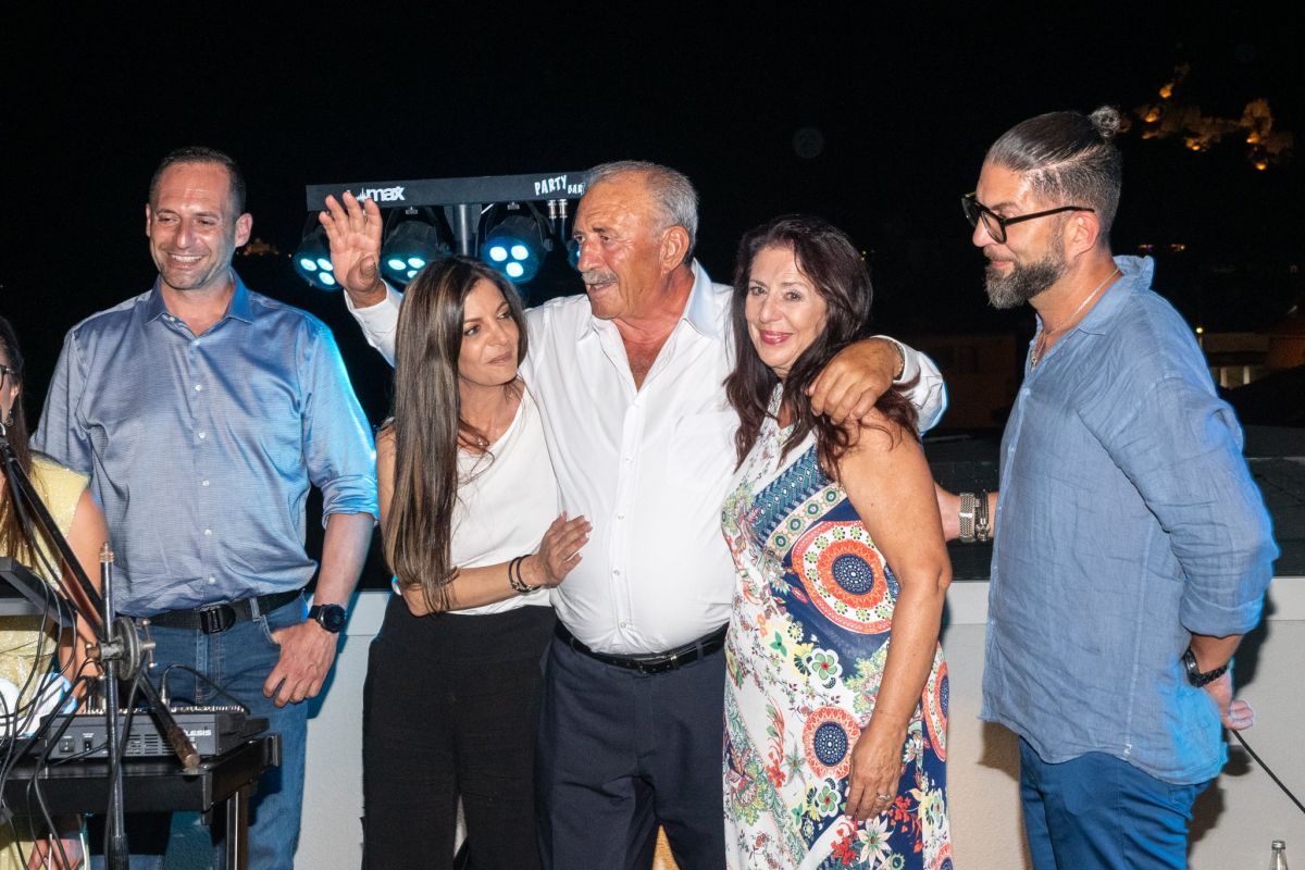 Nikos Giokos with his wife Natassa and their children during the grand opening of the Grand Patelli hotel.