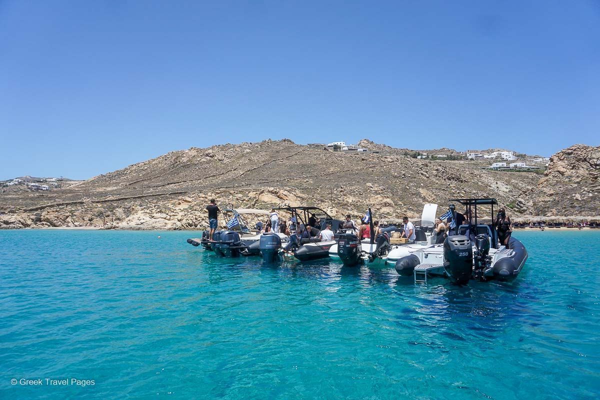 Uber Boat full day experience on Mykonos: Speedboats offering the Uber Boat service lined up.