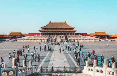 Tourists at the Forbidden City, Beijing, China. Photo by Ling Tang on Unsplash