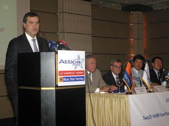 Andreas Vgenopoulos, president of Marfin Investment Group. Seated to his left are Mihalis Sakellis, chief executive officer of Blue Star Ferries, and Petros Vettas, chief executive officer of Attica Group.